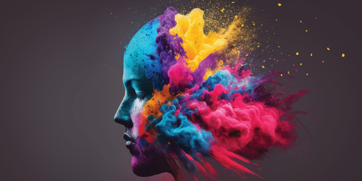 Human profile with an explosion of vibrant colors: blue, yellow, purple, pink.