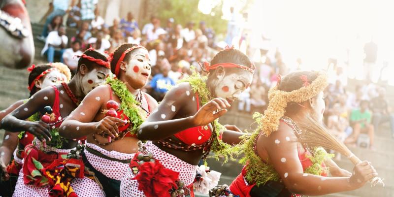 Traditional Bwiti ceremony in Gabon, Africa.jpg African women with painted faces of the Bwiti religion dance in a traditional ceremony