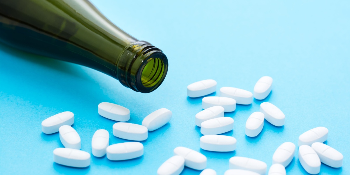 a bottle of alcohol and trazodone pills