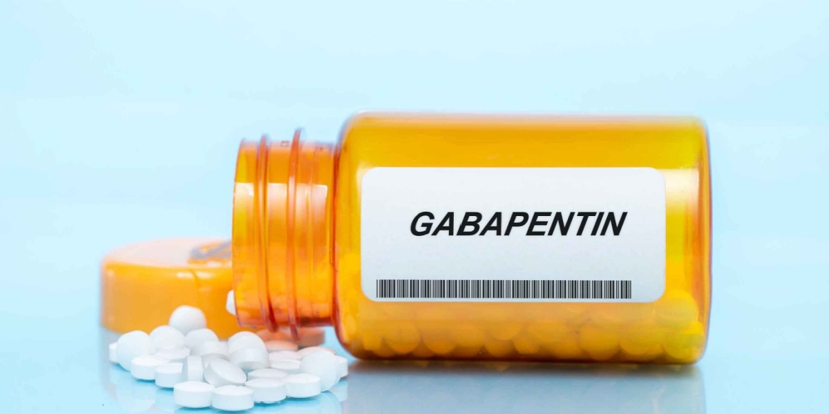 a photo of an entire bottle labeled gabapentin with pills spilling out of it