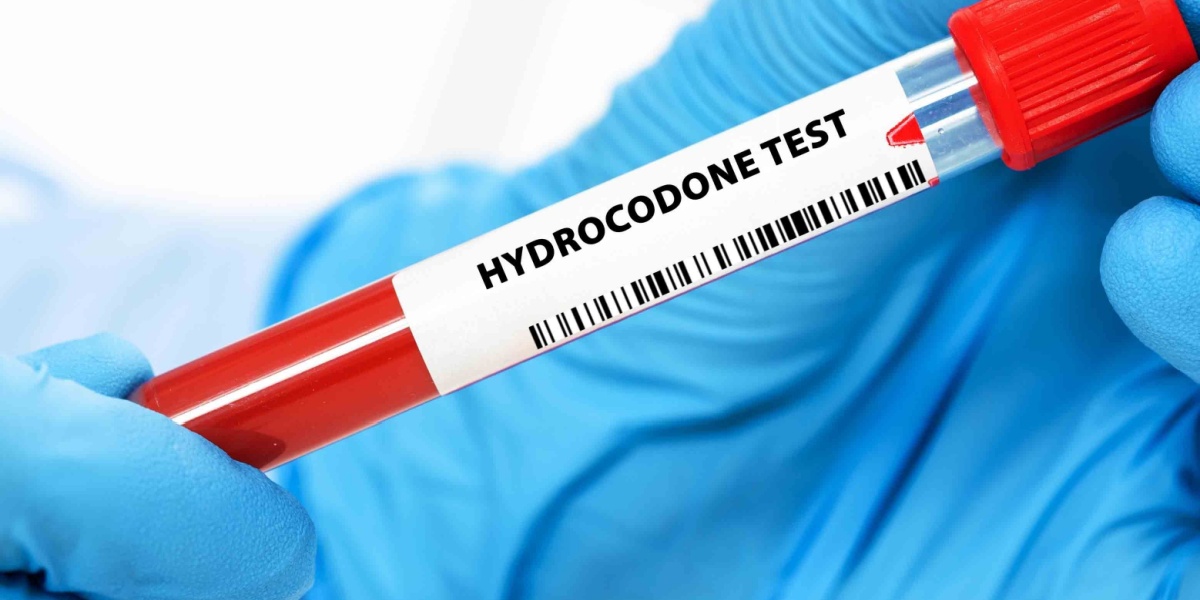 a gloved hand holding a test tube labeled Hydrocodone test