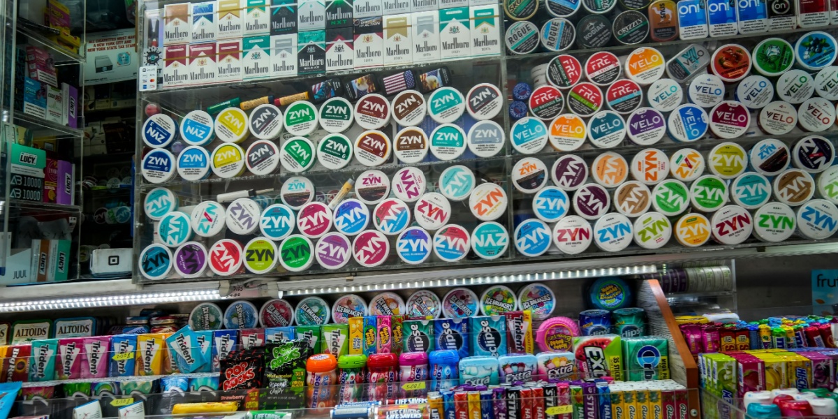 a photo of glass cases full of colorful Zyn products