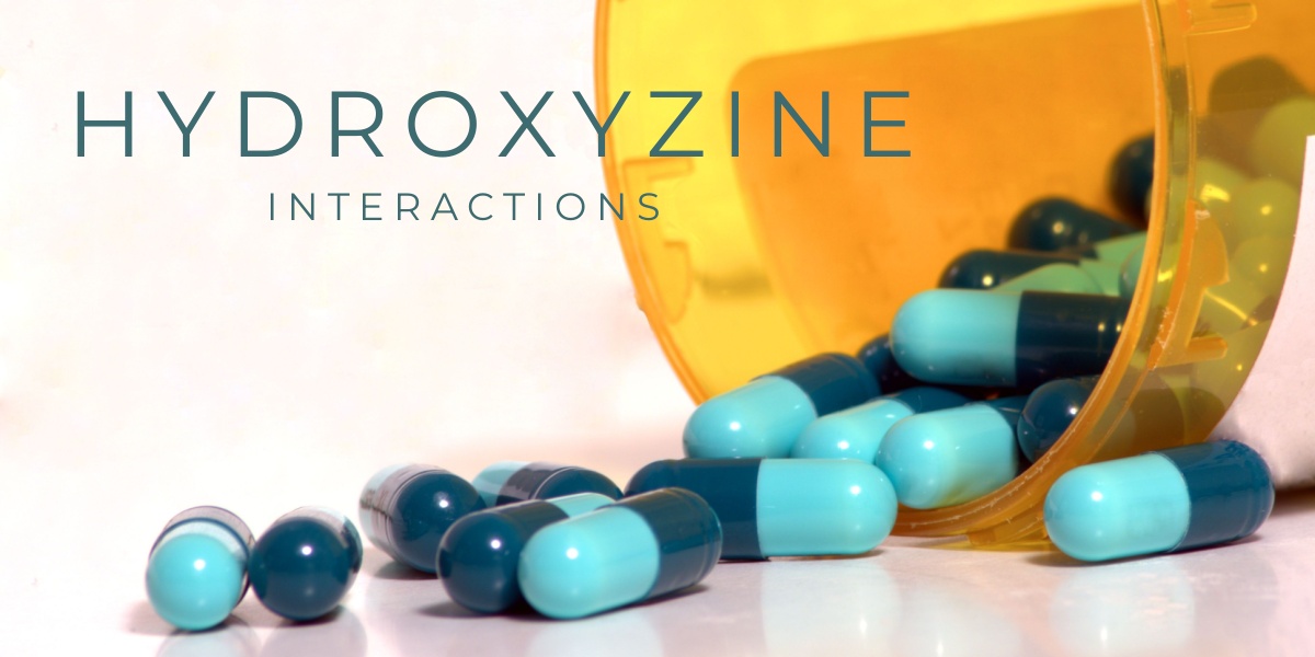 a close up photo of hydroxyzine pills spilling out of an orange pill bottle, with the words