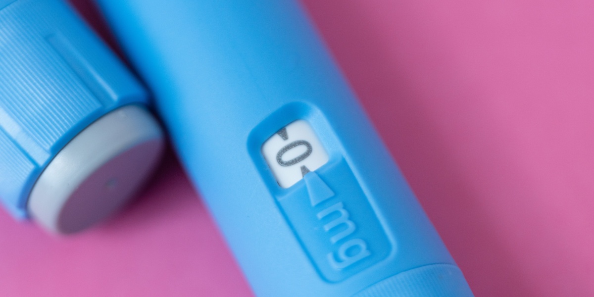 A close up photo of an Ozempic pen with the counter at zero