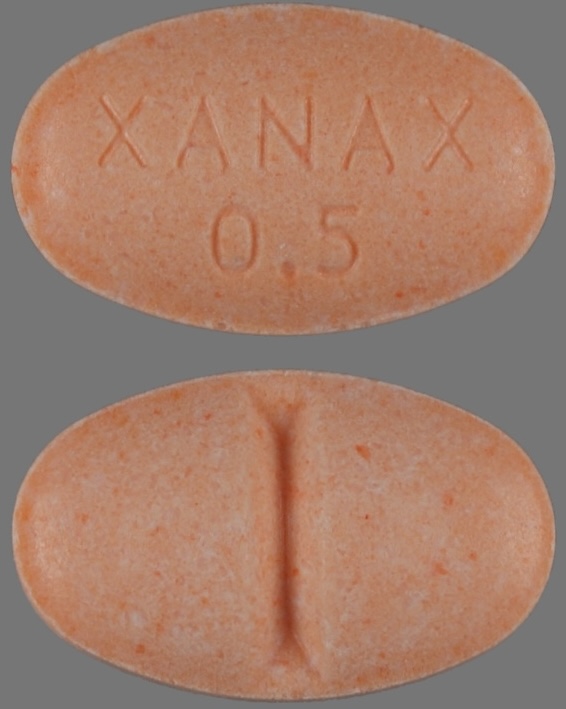 .5 mg of orange Xanax (alprazolam) pill front and back view